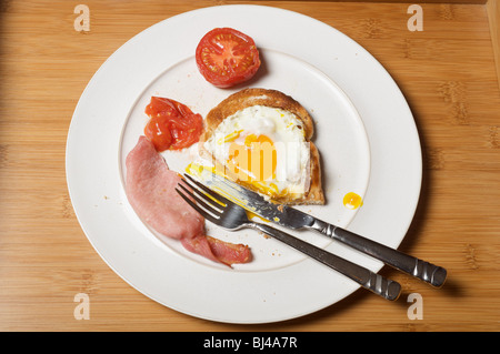 Half-eaten English breakfast Stock Photo