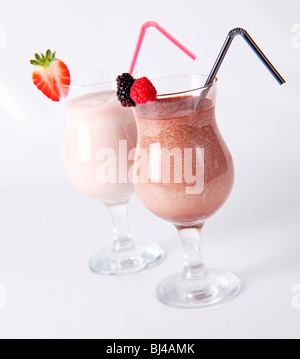 Chocolate vanilla strawberry milk shake milkshake collection straw in a cup  isolated on a white background Stock Photo - Alamy