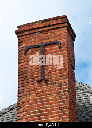 Decorative letter 'T' reinforcing chimney stack - France. Stock Photo