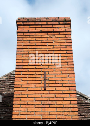 Decorative letter 'I' reinforcing chimney stack - France. Stock Photo