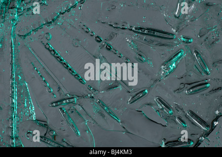 Ice with bubbles of air abstract green blue macro background texture Stock Photo