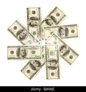 Artistic pattern made from dollar bills Snowflake star or closed aperture Isolated with a clipping path on white background Stock Photo