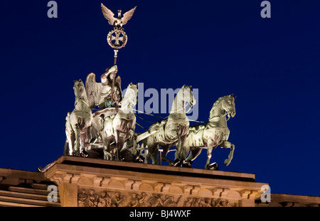 A quadriga, or four-horse chariot, atop the Brandenberg Gate (Brandemburg Tor), Pariser Platz, Berlin-Mitte, Germany Stock Photo