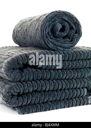 A stack of bath towels isolated against a white background Stock Photo
