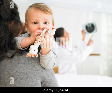 Mother and baby at the doctors office Stock Photo