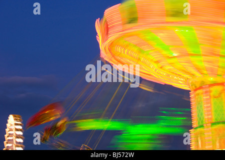 Rotating carrousel by night Stock Photo