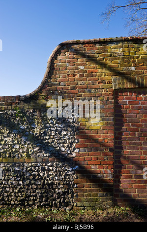 typical Buckinghamshire brick and flint wall on the outskirts of old Amersham Buckinghamshire UK Stock Photo