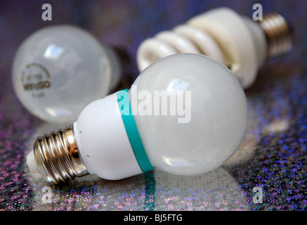 Super energy efficient LED lightbulb with tungsten and low energy ones behind Stock Photo