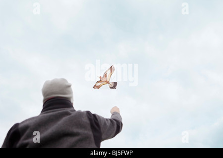 Man flies a kite Stock Photo