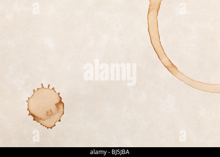 coffee stain isolated on a parchment paper background Stock Photo