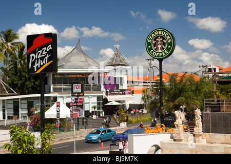 Indonesia, Bali, Kuta, Jalan Kartika Plaza, Pizza Hut and Starbucks Coffee signs Stock Photo