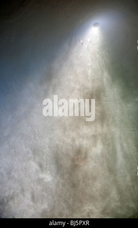 Sun glowing through a very thin wall of snow , Finland Stock Photo