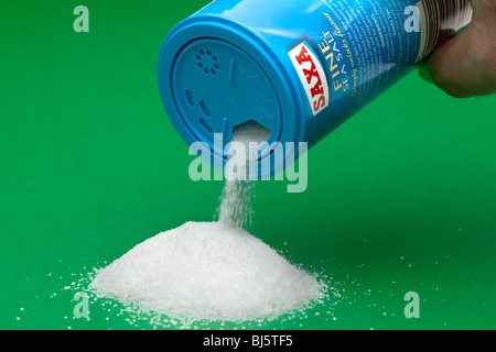 Saxa Fine ground sea salt pouring from a container Stock Photo