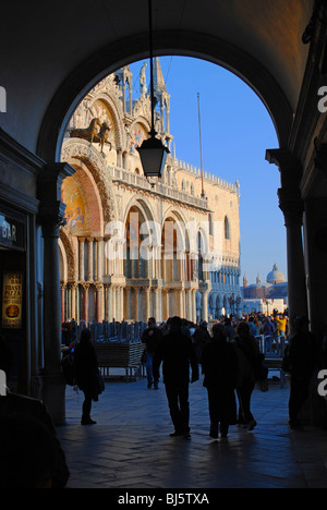 St Mark's Basilica seen through an archway in the evening. Stock Photo