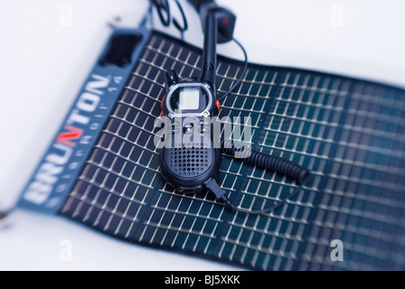 Portable solar panel charging a radio in the backcountry, Sequoia National Park, California Stock Photo