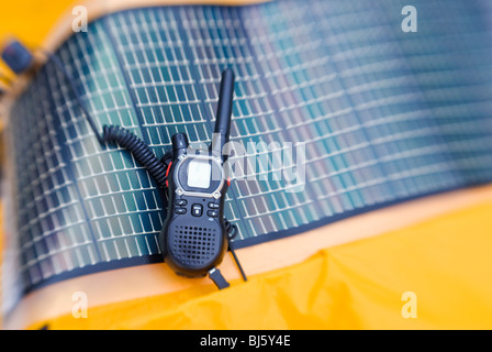 Portable solar panel charging a radio in the backcountry, Sequoia National Park, California Stock Photo