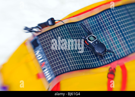 Portable solar panel charging a radio in the backcountry, Sequoia National Park, California Stock Photo