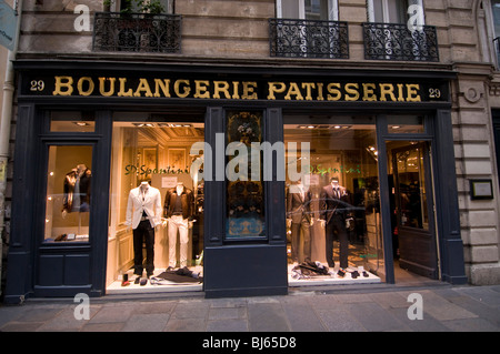 Fashion shop with original bakery sign, Rue des Francs Bougeois, Marais Quarter, Paris, France. Stock Photo