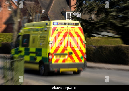 An ambulance going away with blur, UK Stock Photo