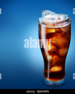 Refreshing glass of cola with ice. On stone table with copy space. Flat ...