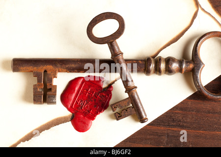 Sealed Valentine love letter with vintage rusty keys Stock Photo