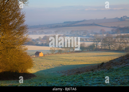 Early morning mist and light in the Vale of Belvoir Leicestershire Stock Photo