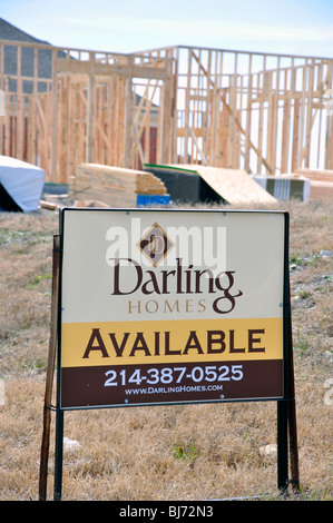 AVAILABLE sign on lot for house to be constructed Stock Photo