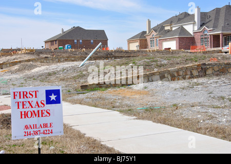 AVAILABLE sign on lot for house to be constructed Stock Photo