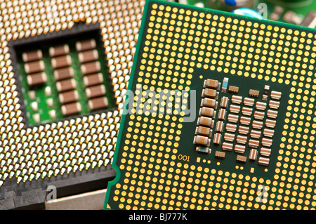 Computer microprocessor and it's port in the motherboard Stock Photo