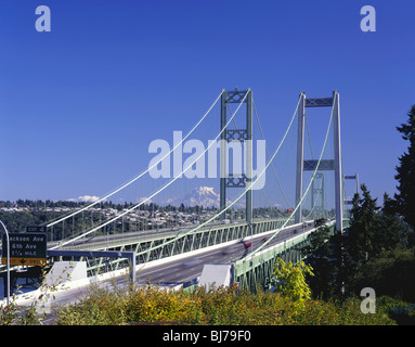 WASHINGTON - The Tacoma Narrows Bridge with Mount Rainier in the distance. Stock Photo