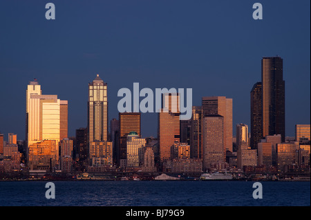 Retro image, Seattle Skyline from West Seattle with Elliott Bay and city lights Seattle Washington State USA Stock Photo