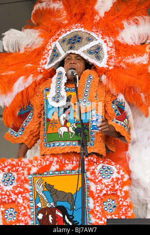 Mardi Gras Indian performing at the New Orleans Jazz & Heritage Festival. Stock Photo