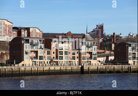 River side development on the north bank of the river Tyne at Newcastle, Byker Wall is visible in the background. Stock Photo