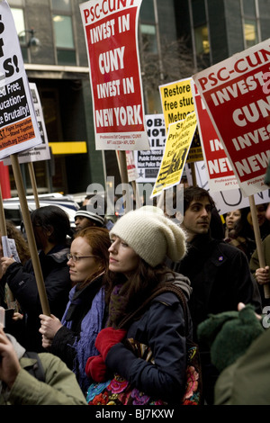 College students and faculty demonstrate outside New York governor's office in Manhattan against more budget cuts to education. Stock Photo