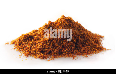 pile of Cayenne pepper powder  composed arrangement isolated against a white background Stock Photo