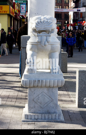 White Marble Chinese Fu Lion Sculpture in Boston's Chinatown. Stock Photo