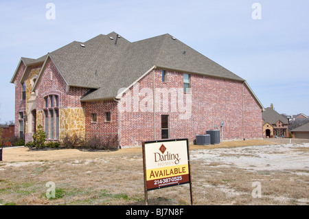 AVAILABLE sign on lot for house to be constructed Stock Photo