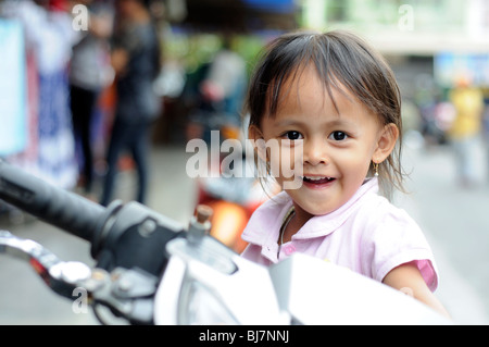 small girl in tanjung Pinang, Bintan, Indonesia Stock Photo