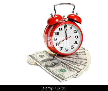 'Time is money' concept - classic alarm clock over dollars Stock Photo