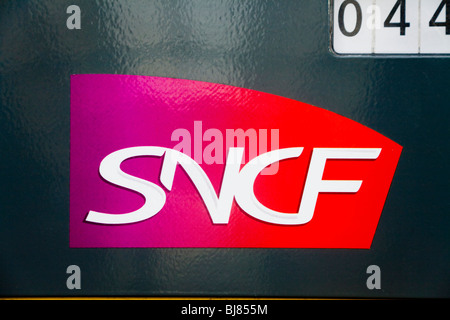 SNCF corporate identity / ident / logo / icon on the side of a French train carriage in France. Stock Photo