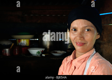 woman in warung, Pekanbaru, Sumatra, Indonesia Stock Photo