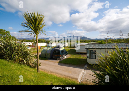 A camp site at Killorglin, Kerry, Ireland, with a view of Carrauntoohil and the MacGillicuddy's Reeks mountain range. Stock Photo