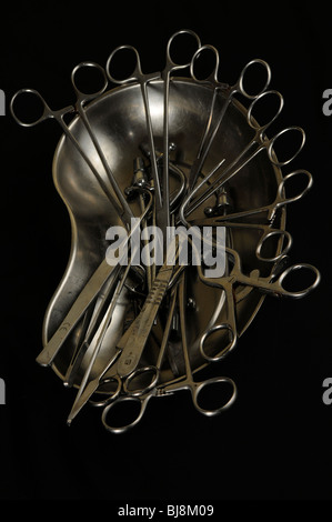 Embalming instruments in a stainless steel kidney dish Stock Photo