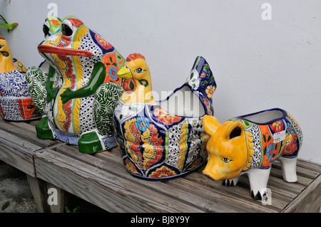 Ceramic plant holders shaped like animal displayed outside a shop in St. Augustine Florida Stock Photo