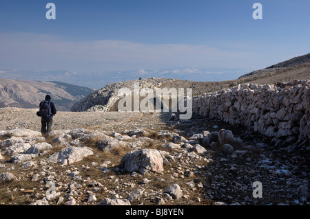 Hiker on Obzova mountain near Baška, island Krk, Croatia Stock Photo