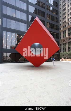 Red Cube Sculpture in New York, USA Stock Photo