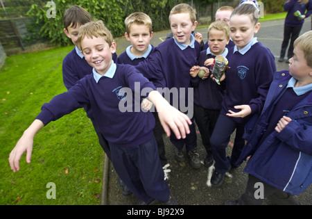 Monsters traditional playground games being played on the schoolyard of a primary school in Wales UK Stock Photo