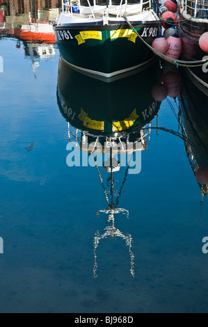 dh  STROMNESS ORKNEY Fishingboats reflection in harbour mirror image fishing boat reflections Stock Photo