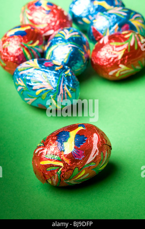 Easter chocolate eggs wrapped in color paper Stock Photo