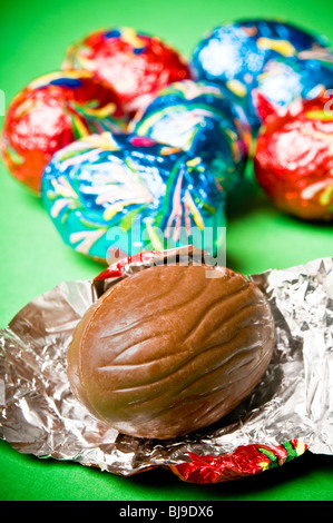 Easter chocolate eggs wrapped in color paper Stock Photo
